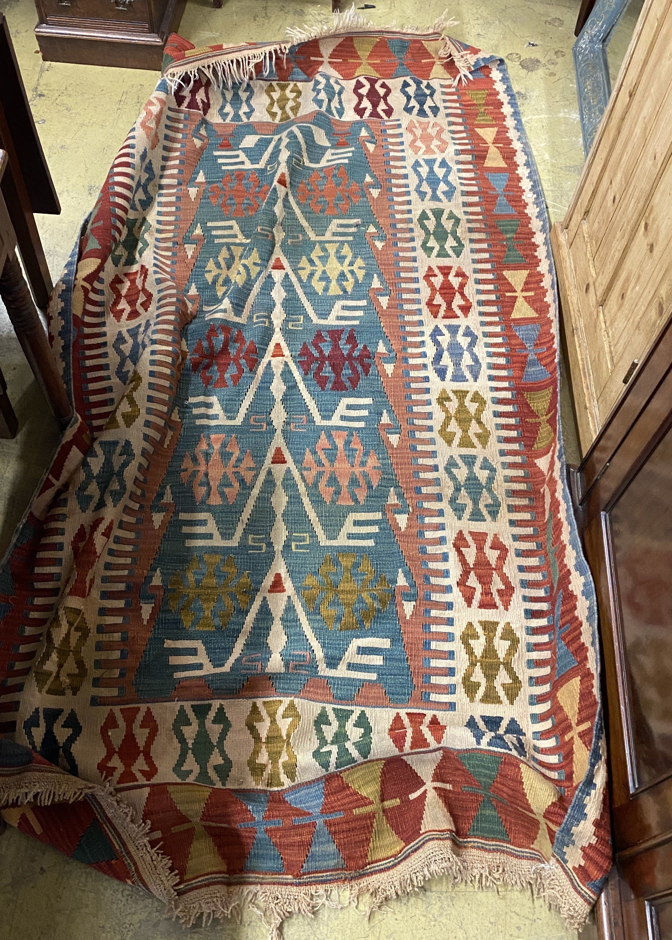 A polychrome Kelim flatweave rug, 230 x 120cm